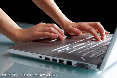 One press of a finger...Modern laptop isolated...